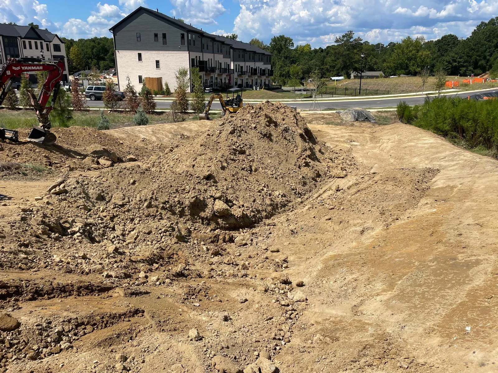 Site before stone pad installation at Midtown Rows