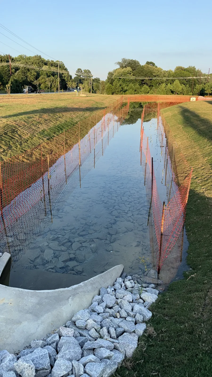 Stormwater channel at golden hour at Parc Townes at Wendell
