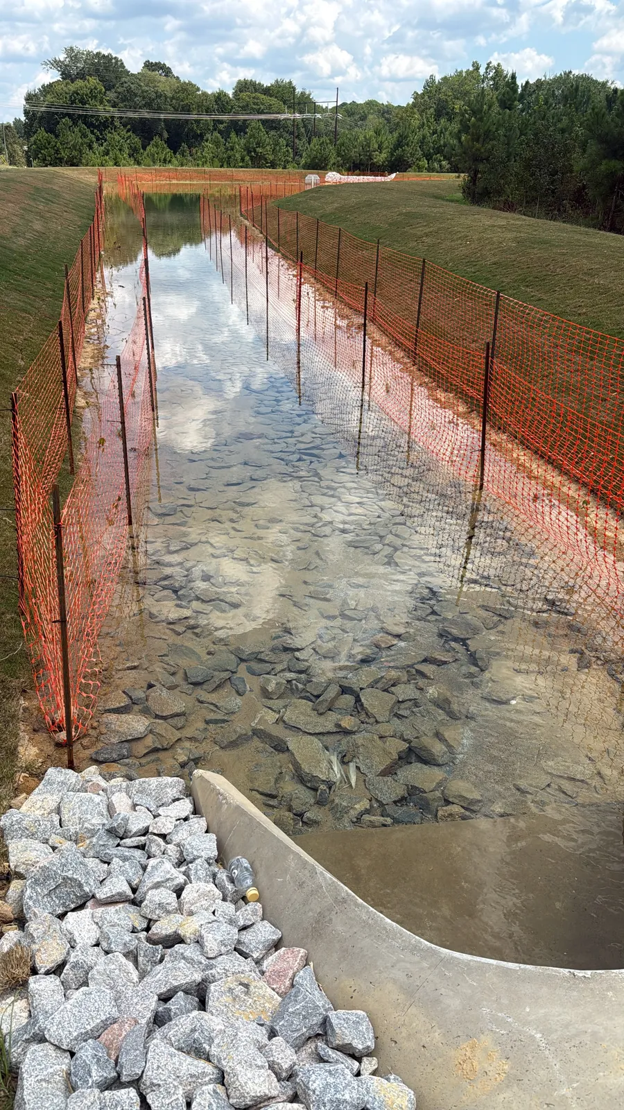 Rip-rap lined stormwater channel at Parc Townes at Wendell